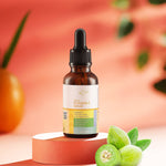 Close-up of dropper dispensing the Vitamin C Face Serum showing texture